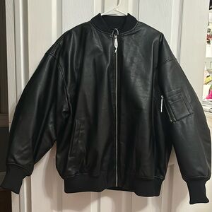 Super cute leather jacket for sale. New with tags. More on the oversized side.